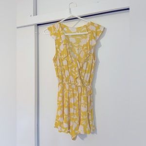 Fun, flirty yellow flowery romper